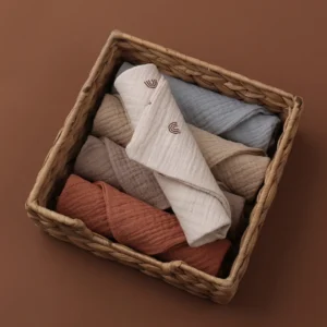 Muslin Baby Washcloth Set made from soft cotton gauze with five reusable baby towels in neutral colors